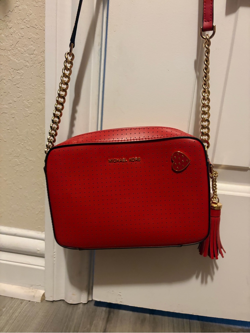 Michael Kors Red Perforated Crossbody with Gold Chain and Tassel